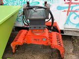 a small machine that is sitting on the ground