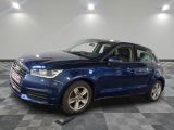 a picture of a blue car parked in a garage
