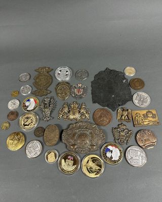 some of the medals and medals are on display on the table