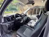 a view of the inside of a van from the driver ' s seat