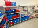 many baskets on the shelves in the store