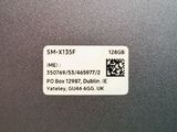 a close up of the back of a laptop with a qr code on it