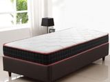 an image of a bed with a mattress on top of it in a room