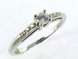 a picture of a diamond ring on a white background