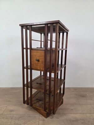an image of a wooden display case with a drawer on top of it