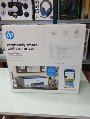 a box of hp products on a table in a store