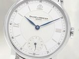 Gros plan sur une montre-bracelet avec un bracelet marron