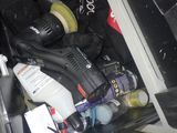 a close up of a drawer full of cleaning supplies