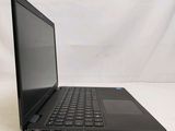 a black laptop computer sitting on a white surface