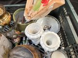 a basket full of old and new items that are sitting on a table