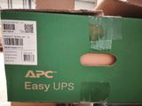 a green box that has a piece of paper in it
