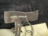 the label of a black bag is attached to the back of the bag