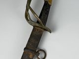 a close up of a knife with a metal handle