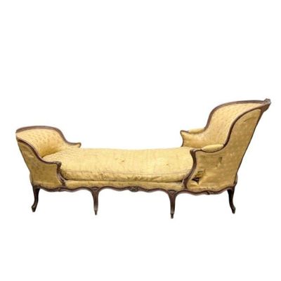 an image of a chaise lounger made of wood and upholstered with a yellow upholstered seat