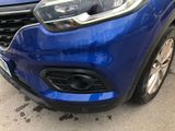 a close up of the front of a blue car