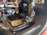 an image of a forklift with a seat in the back