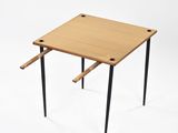 an image of a small wooden table with black legs on a white background