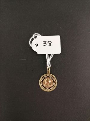 a close up of a tag on a black surface with a tag attached to it