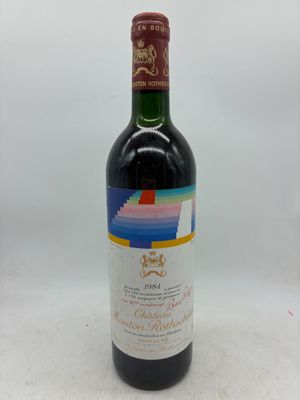 a bottle of wine that is sitting on a table