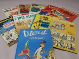 de nombreux livres pour enfants qui se trouvent sur la table