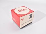 a red and white box with a logo on it