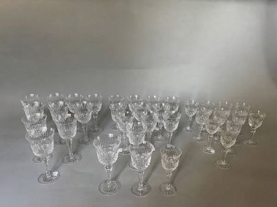 a lot of wine glasses sitting on a table