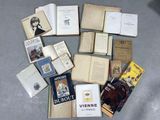 a lot of books that are laying out on the floor