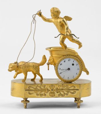 Pendulette en bronze représentant cupidon sur son char condu…