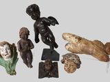 several figurines of different shapes and sizes are displayed on a table