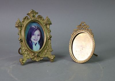 a picture of a girl in a picture frame next to a picture of a girl
