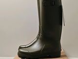 a box with a pair of rain boots on top of it