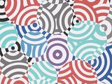 a picture of a pattern of circles and dots on a wall