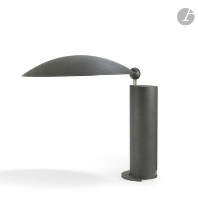 a close up of a table lamp on a white surface