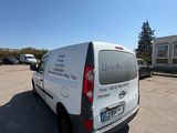 a van that is parked in a parking lot