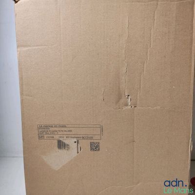 a cardboard box with a sticker on the side of it