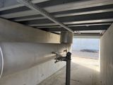 a pipe that is attached to the side of a building
