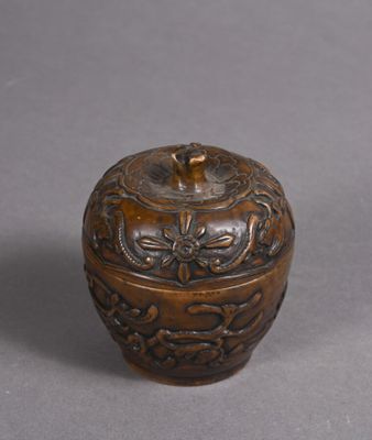 an image of a small wooden box sitting on top of a table