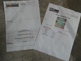 two papers on the ground with a picture of a swimming pool