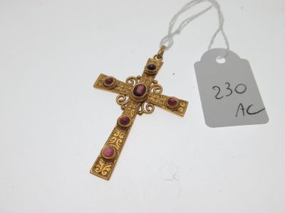 a close up of a cross with a price tag attached to it