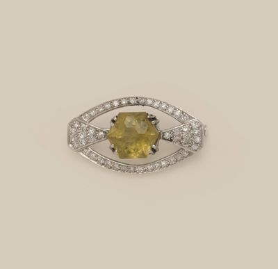 a yellow sapphire and diamond ring
