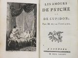 un vieux livre avec la photo d'une femme dans un lit
