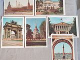 several old postcards of a building with a clock tower in the background