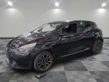 a picture of a black car parked in a garage