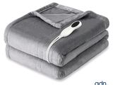 a blanket that has a remote control on top of it
