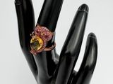 an image of a ring on a mannequin ' s hand