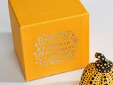 a yellow box with a black and white design on it