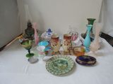 a table with a lot of glass items on it