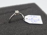 a diamond ring with a price tag attached to it