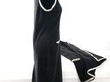 a black dress on a mannequin on a white background