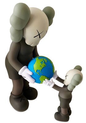 a figurine of a man holding a small earth globe